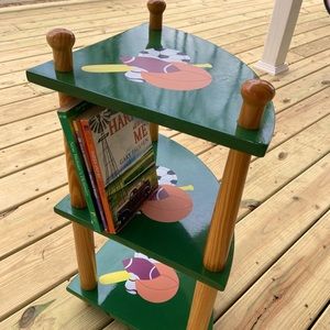 3-tiered corner table, sports motif.